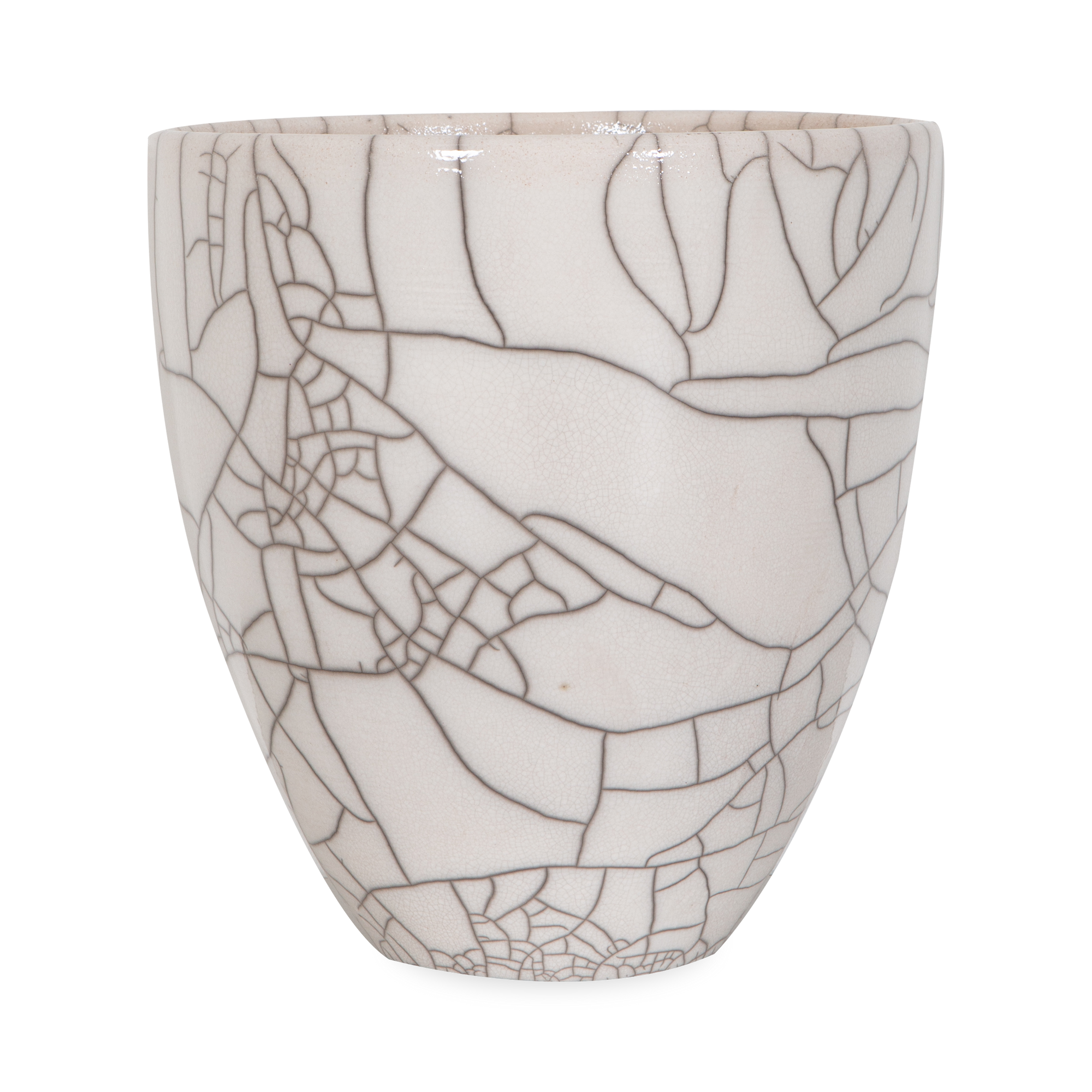 The Raku Planter features a white crackle finish, which is created due to the highly reactive Raku glaze and a low-firing process that involves controlling temperature and deprivin