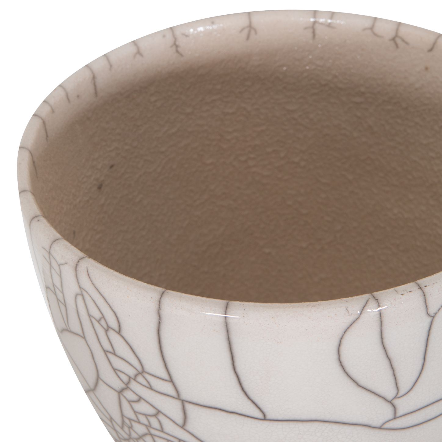 The Raku Planter features a white crackle finish, which is created due to the highly reactive Raku glaze and a low-firing process that involves controlling temperature and deprivin