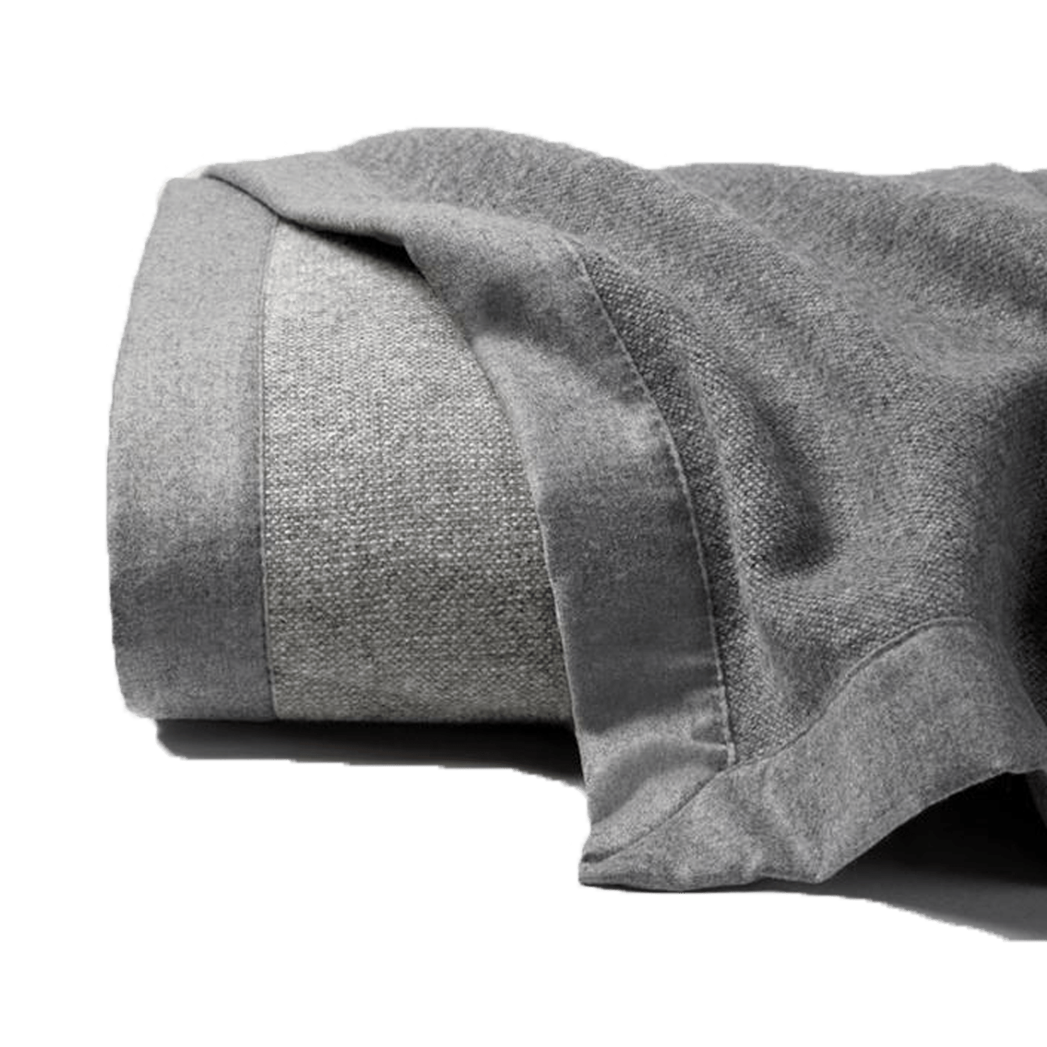 Woven in super-fine Merino wool, the Nerino blanket adds superior warmth and is reversible with differing front and back hues - grey and light grey.