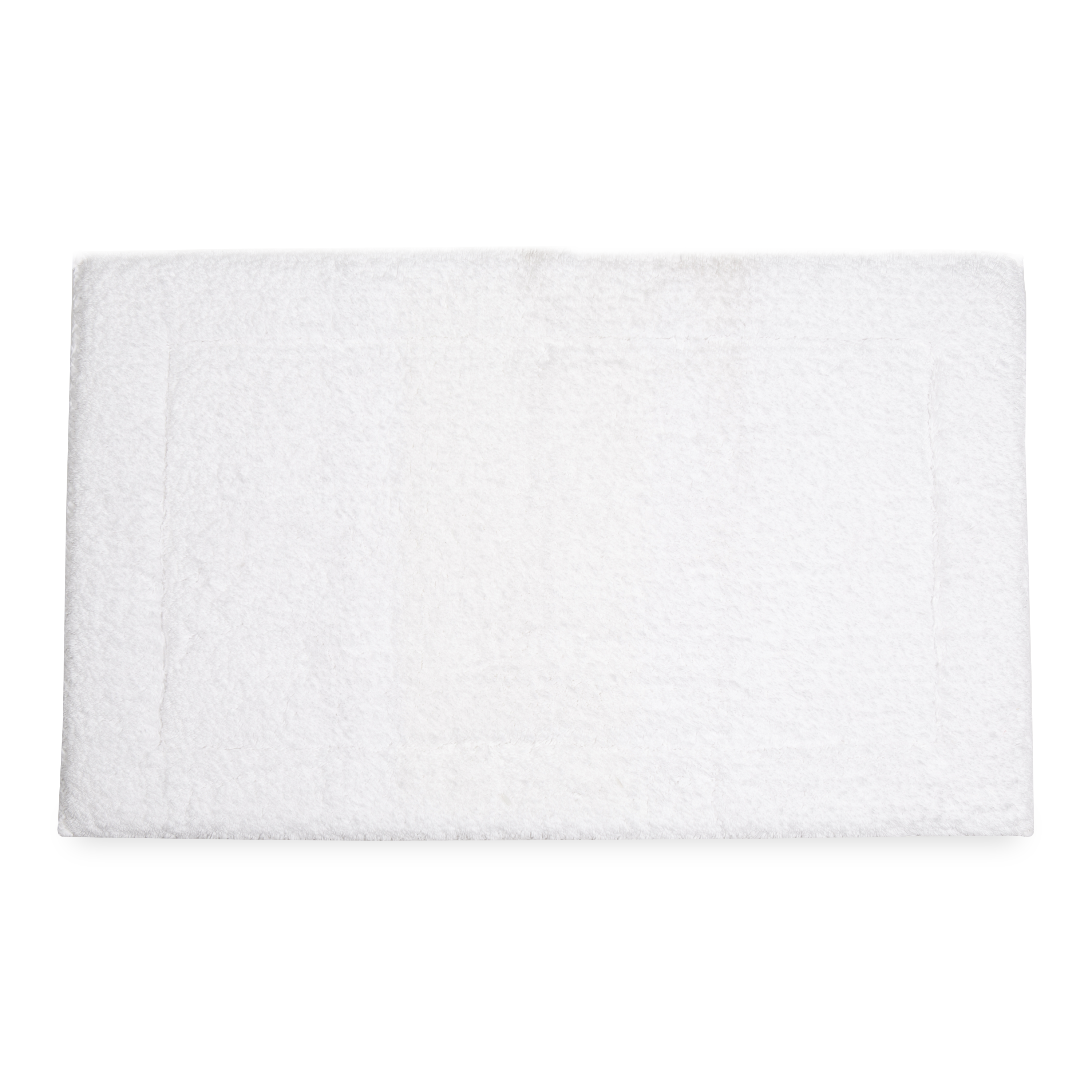 Crafted in a century-old mill in Portugal, this 100% cotton bath rug is fully reversible.