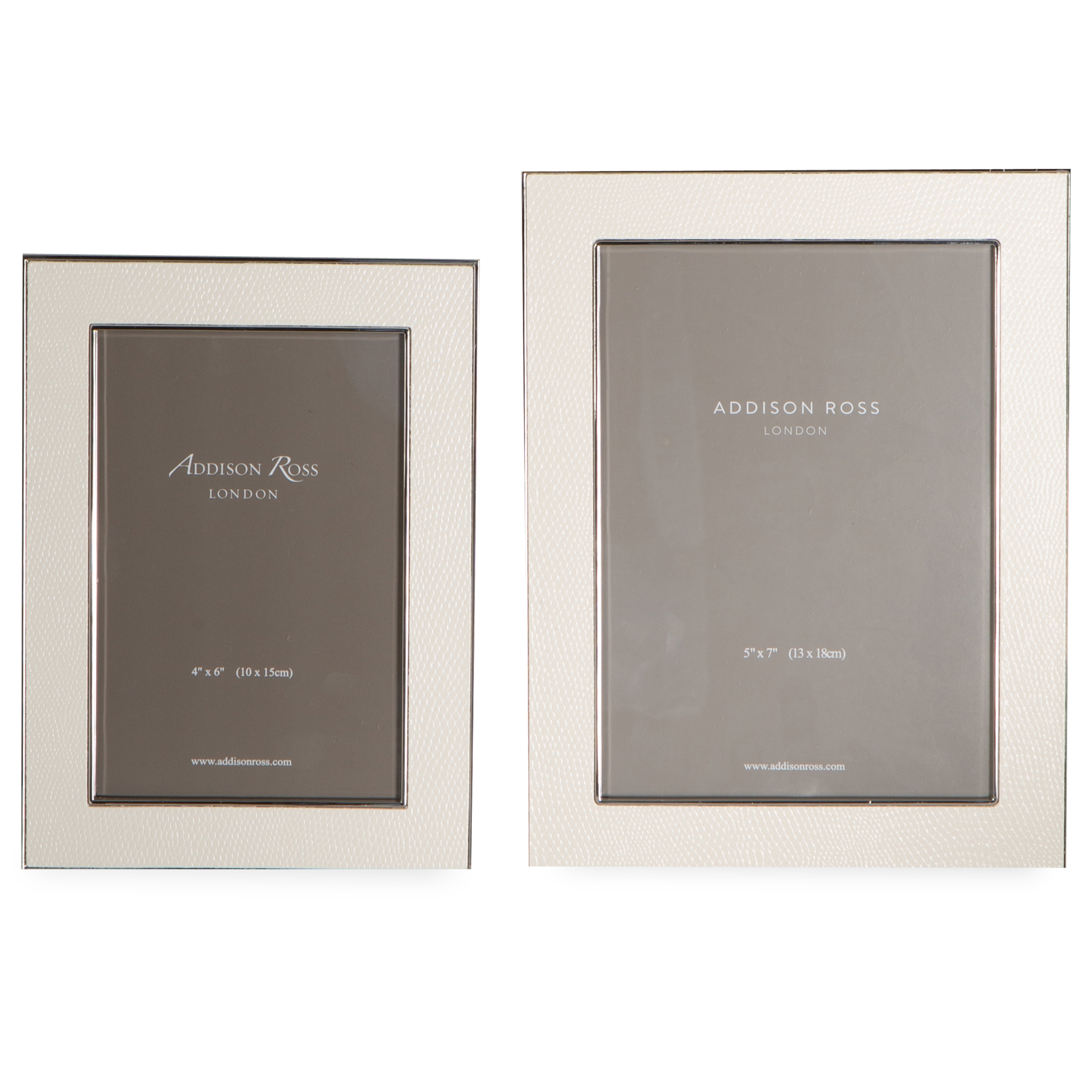 Bold and unique, this picture frame is made with faux white snake skin and silver and is backed with luxury velvet.